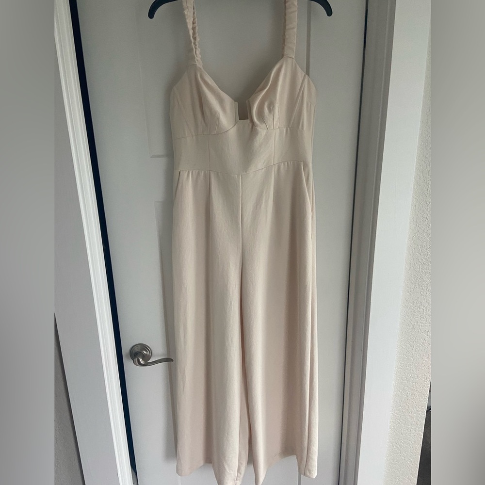 Off white Astr jumpsuit new with tags. Perfect for a rehearsal dinner or shower